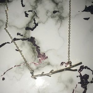 An arrow branch necklace